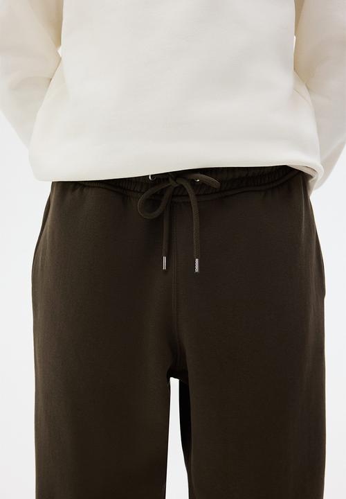H&M - Relaxed fit sweatpants - dark khaki green