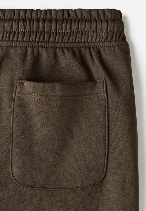 H&M - Relaxed fit sweatpants - dark khaki green