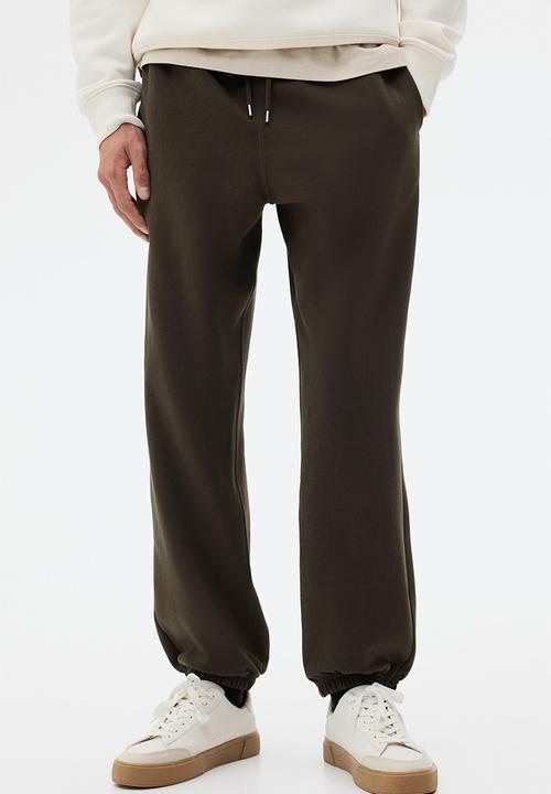 H&M - Relaxed fit sweatpants - dark khaki green