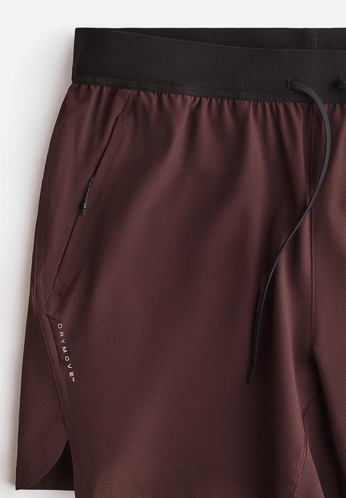 H&M - Double-layered sports shorts with drymove™ - burgundy