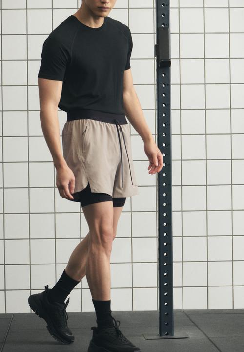 H&M - Double-layered sports shorts with drymove™ - beige/black