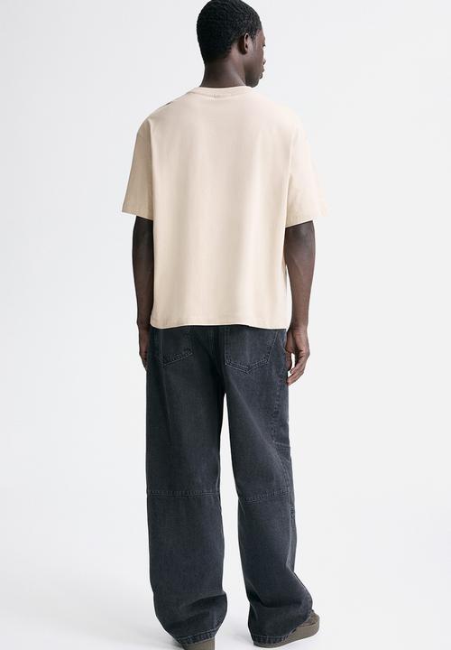 H&M - Loose fit printed T-shirt - beige/run wild