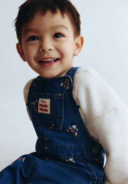 H&M - Printed denim dungarees - denim blue/mickey mouse