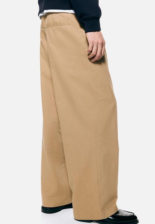 H&M - Loose fit tailored trousers - beige