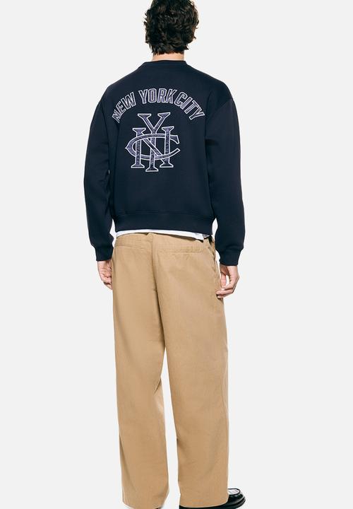 H&M - Loose fit tailored trousers - beige