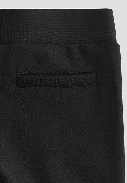 H&M - Studded flared leggings - black