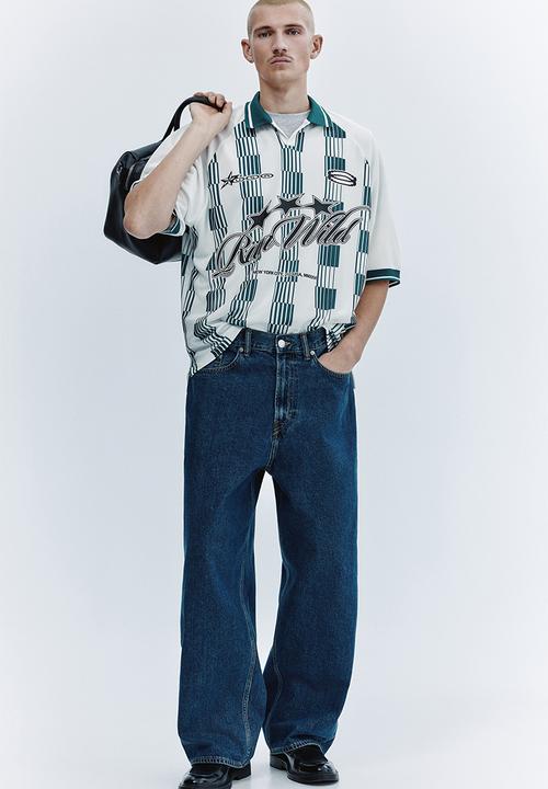 H&M - Loose fit football shirt - white/run wild