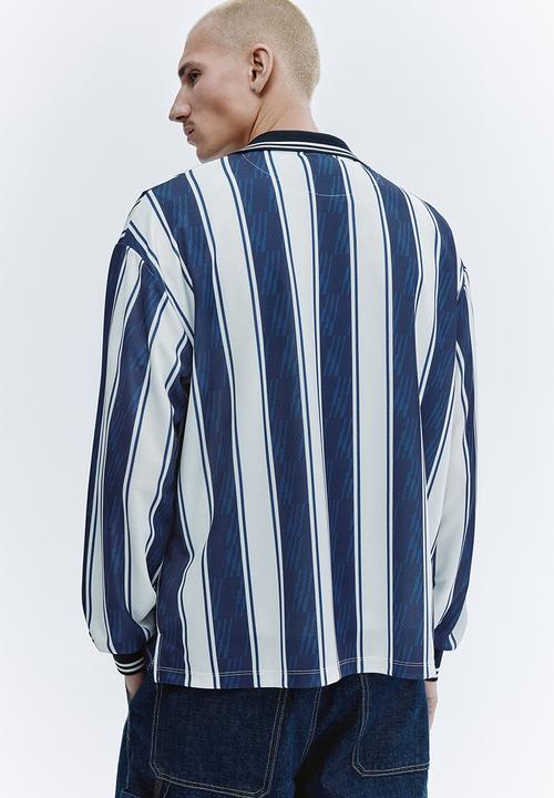 H&M - Loose fit football shirt - dark blue/run wild