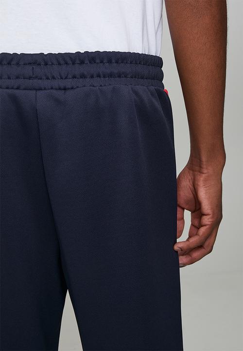 PUMA - T7 Relaxed Big Cat Track Pants op DK - New Navy