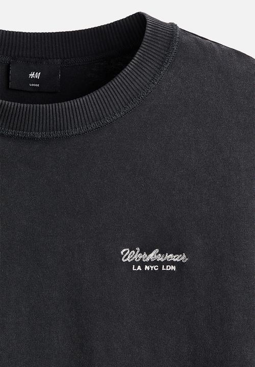 H&M - Loose fit printed T-shirt - black/workwear