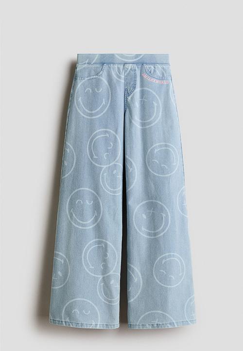 H&M - Denim-look wide trousers - light denim blue/smileyworld