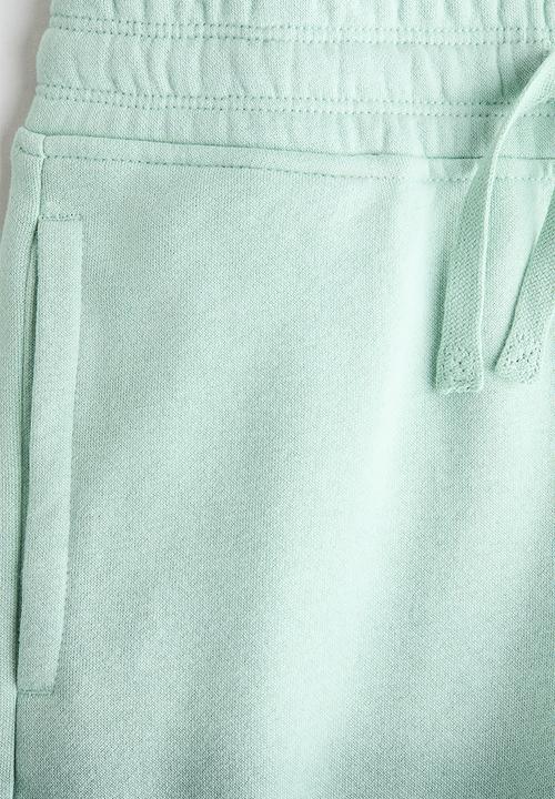 H&M - Printed sweatshorts - green/gradient
