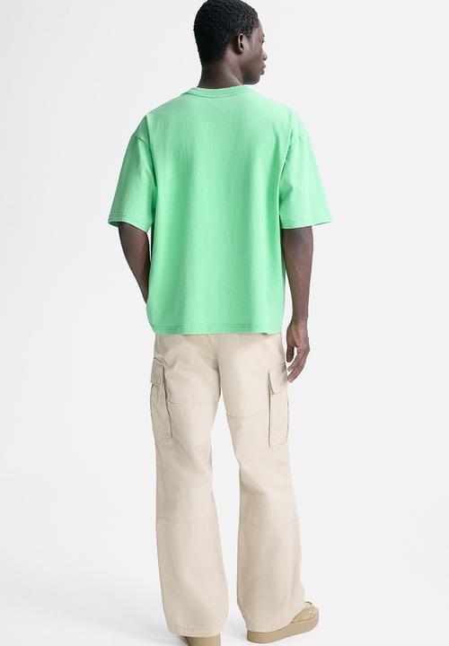 H&M - Loose fit t-shirt - bright green/golden
