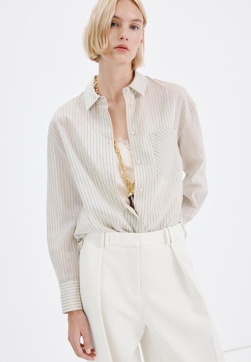 MANGO - Trousers white - white