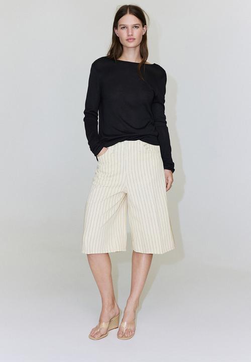 MANGO - Bermudas tony - light/pastel yellow