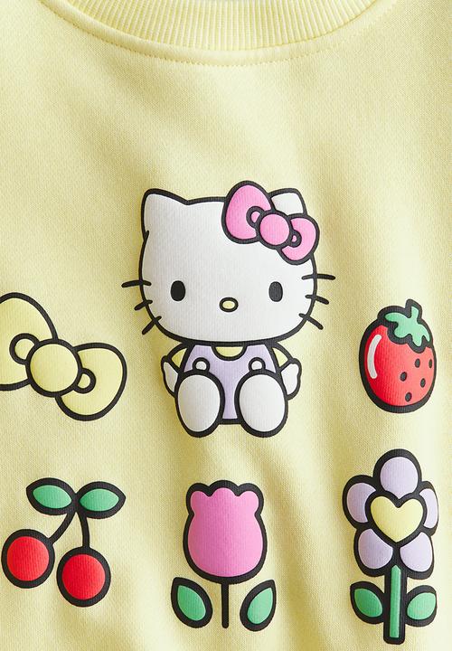 H&M - Printed sweatshirt - yellow/hello kitty