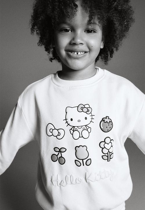 H&M - Printed sweatshirt - yellow/hello kitty