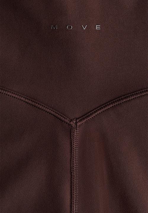H&M - Flared yoga leggings with softmove - warm brown