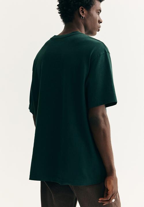 H&M - Loose fit t-shirt - dark green/snoopy