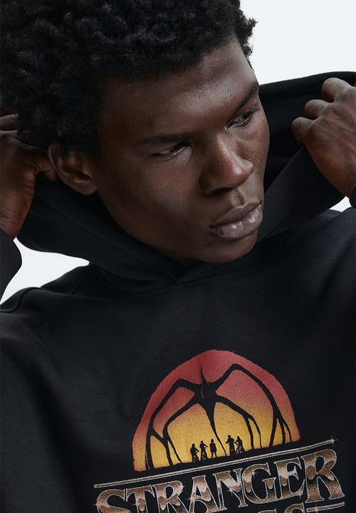 H&M - Loose fit hoodie - black/stranger things