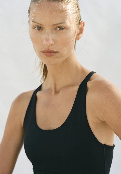 H&M - Sculptmove? sports playsuit - black