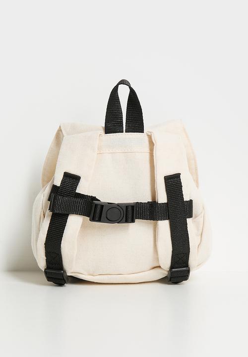 Pop Candy - Floppy ear pup backpack - cream/black