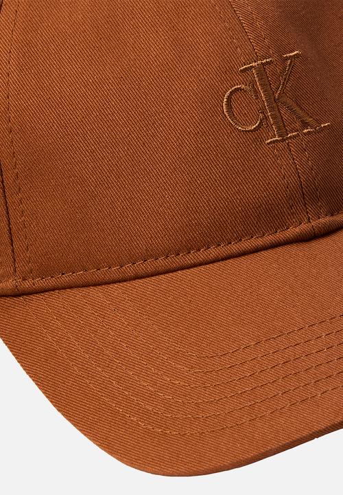 Calvin Klein - Monogram embroidery baseball cap - argan oil