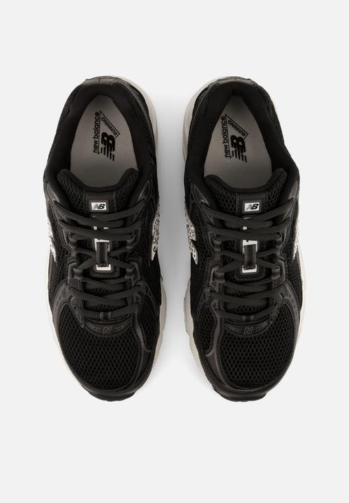New Balance  - 740