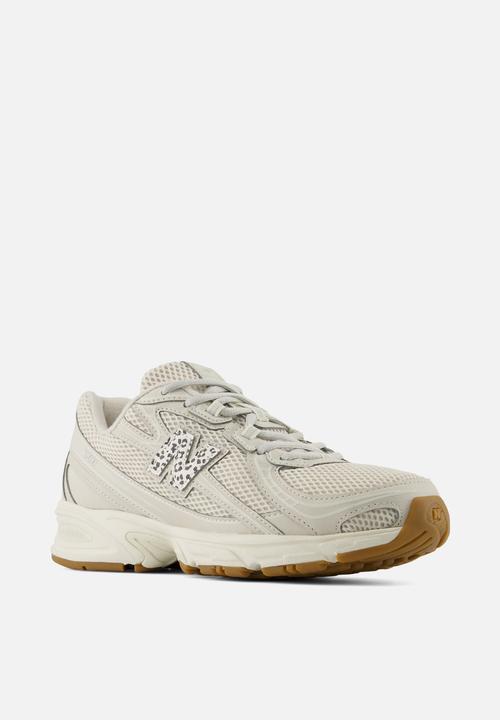 New Balance  - 740
