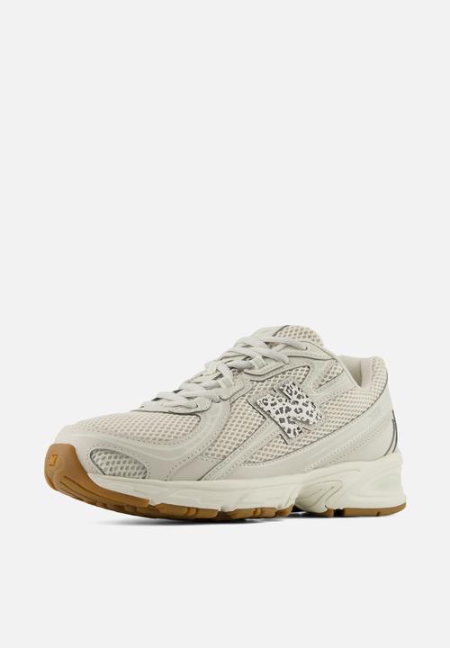 New Balance  - 740