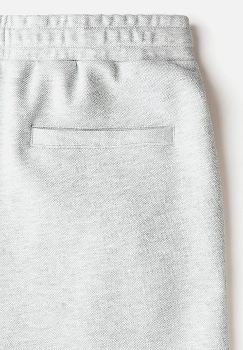H&M - Regular fit tailored joggers - light grey marl