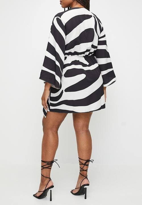 VELVET - Plus exaggerated sleeve mini wrap dress - graded zebra