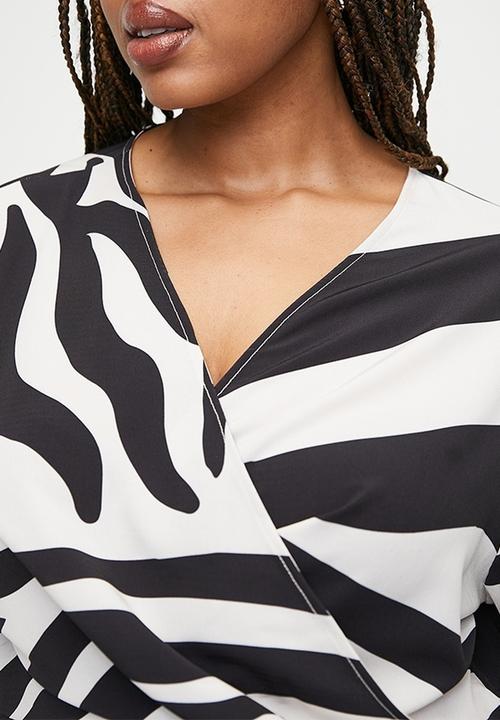 VELVET - Plus exaggerated sleeve mini wrap dress - graded zebra