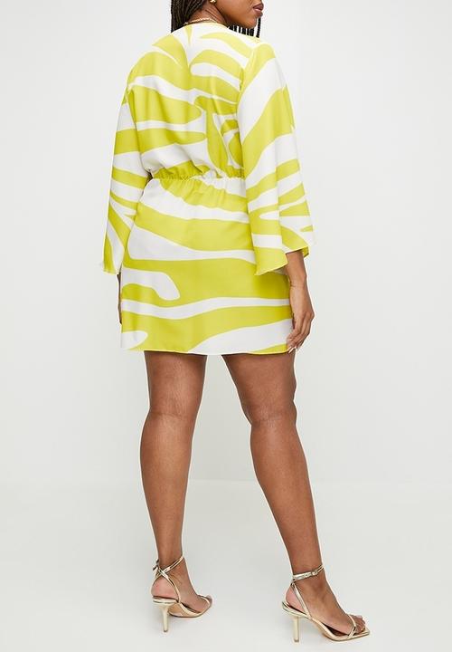 VELVET - Plus exaggerated sleeve mini wrap dress - yellow graded zebra.