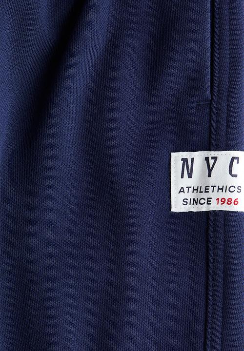 H&M - Motif-detail joggers - navy blue/nyc
