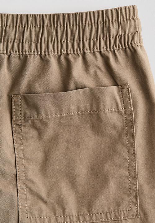 H&M - Loose-fit cotton twill joggers - khaki beige