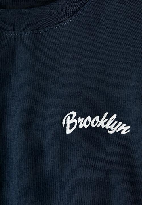 H&M - Loose-fit printed t-shirt - navy blue/brooklyn