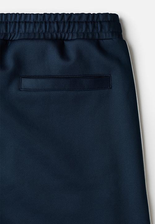 H&M - Relaxed fit shorts - dark blue/white
