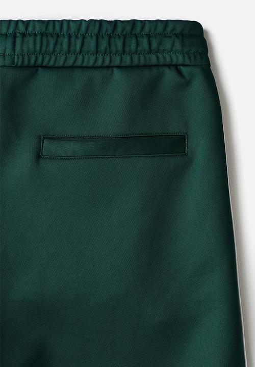 H&M - Relaxed fit shorts - green/white