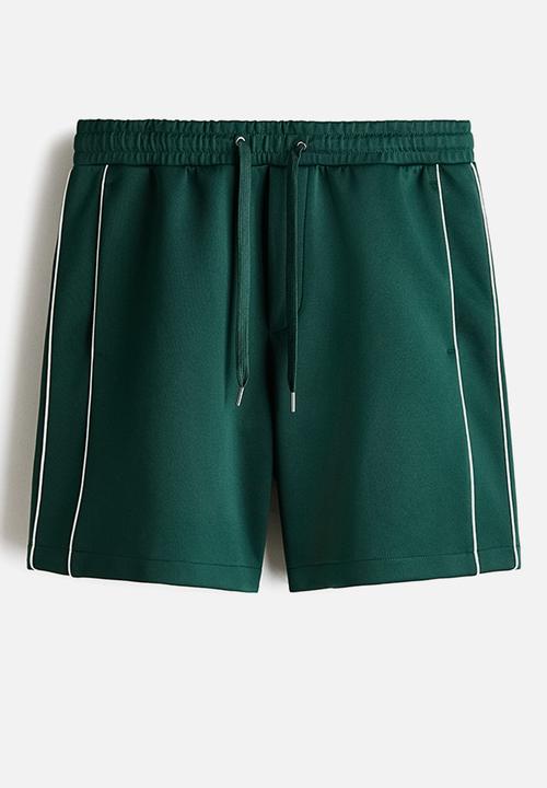 H&M - Relaxed fit shorts - green/white