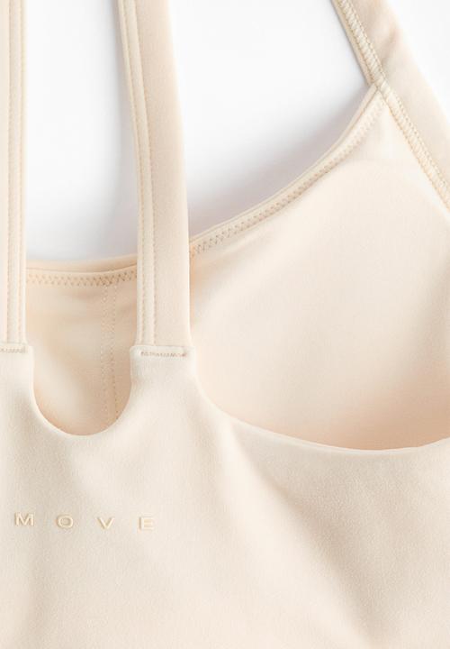 H&M - Medium support sports bra with softmove? - butter yellow