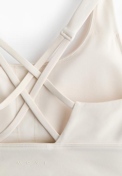 H&M - Medium support sports bra with softmove™ - ivory