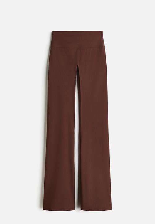H&M - Sculptmove™ flared sports leggings - brown
