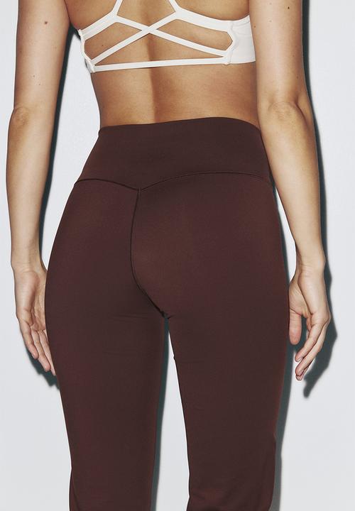 H&M - Sculptmove™ flared sports leggings - brown
