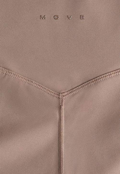 H&M - Sculptmove™ flared sports leggings - beige