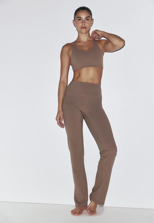 H&M - Sculptmove™ flared sports leggings - beige
