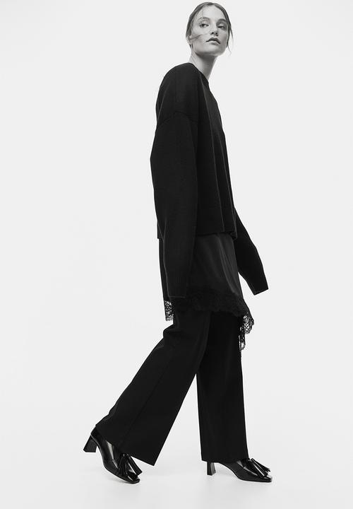 H&M - Flared trousers - black