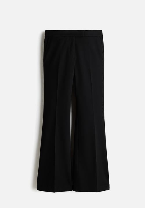 H&M - Flared trousers - black