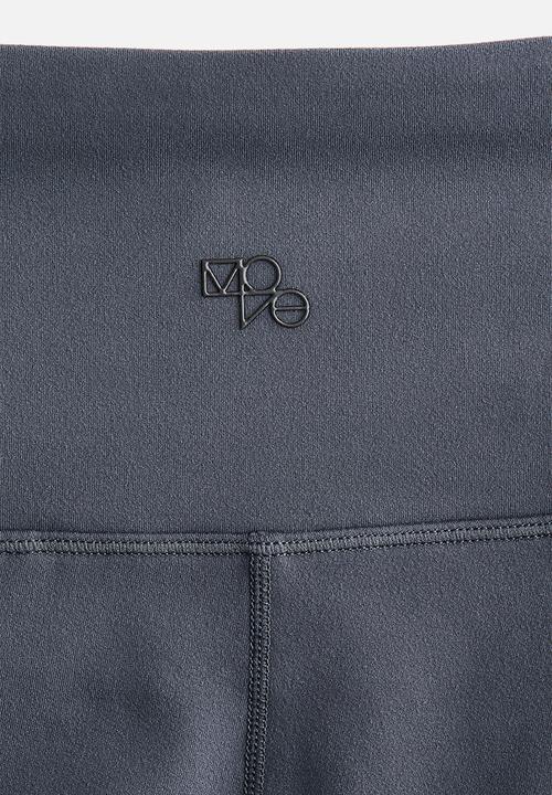 H&M - Wide sports leggings with softmove - dark clay grey