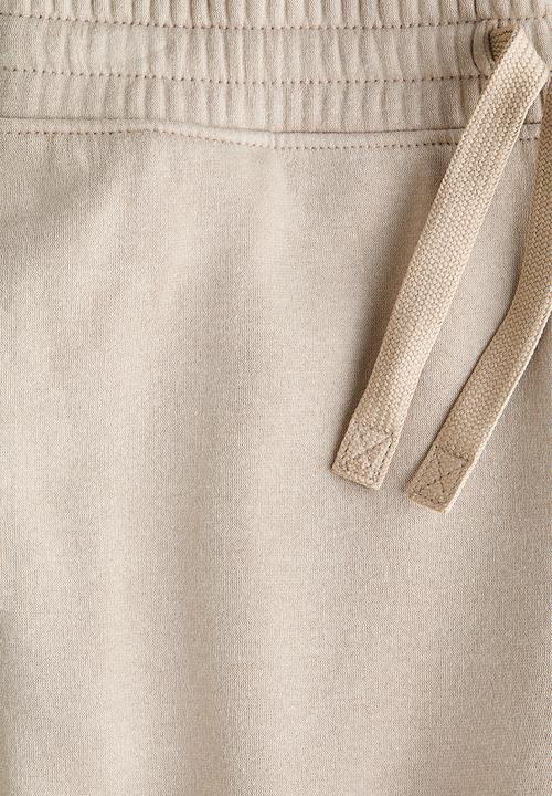 H&M - Cotton sweatshirt joggers - light beige